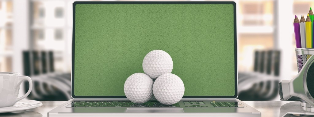 Golf balls on a laptop